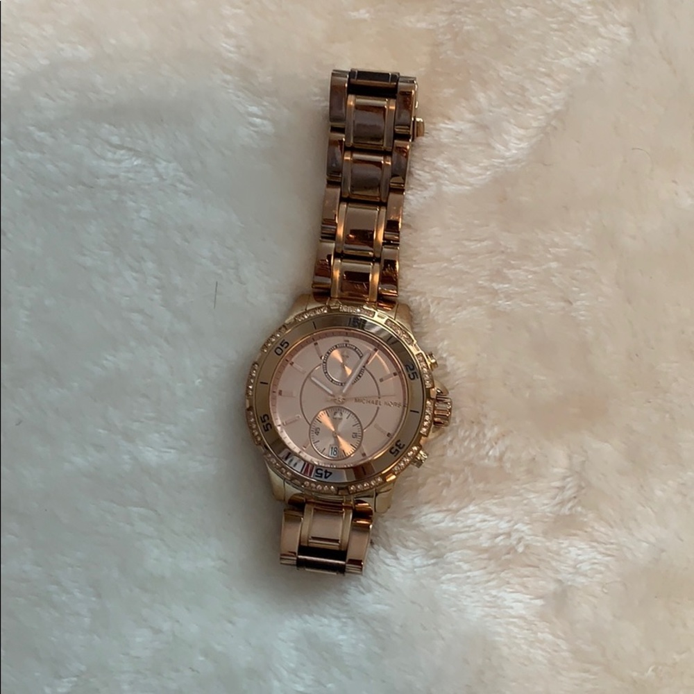 Micheal Kors rose gold women’s watch